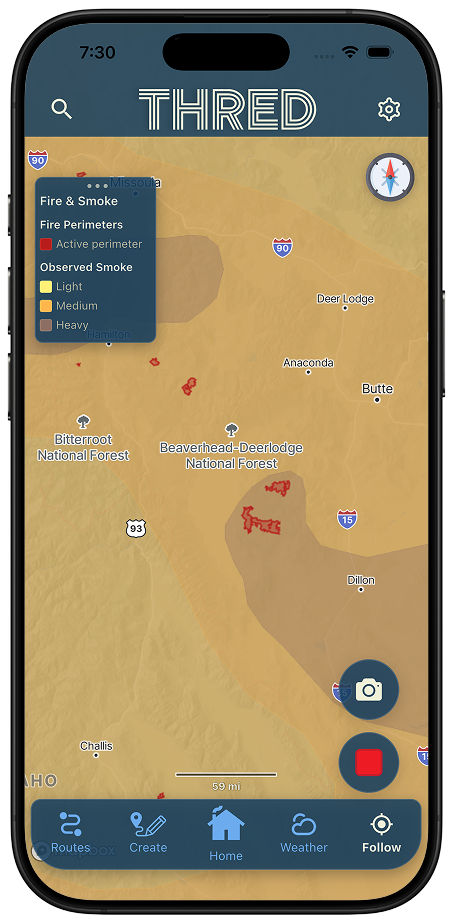 Smoke shading shows how far the haze reaches Thred map over Montana showing broad observed-smoke shading with a legend for light, medium, and heavy smoke alongside active fire perimeters